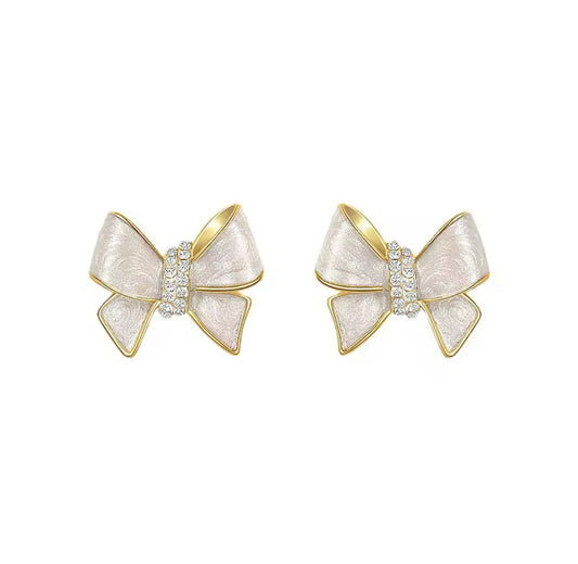 White bow earrings